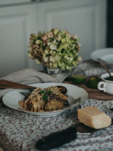 table setting with meatballs and spaghetti