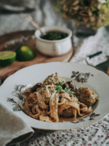 table setting with meatballs and spaghetti